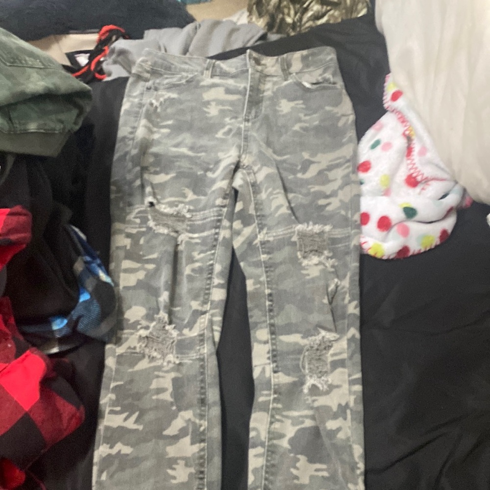 Camouflage ripped up jeans